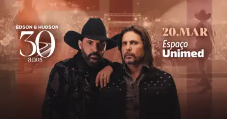 Edson e Hudson durante a turnê de comemoração dos 30 anos de carreira musical