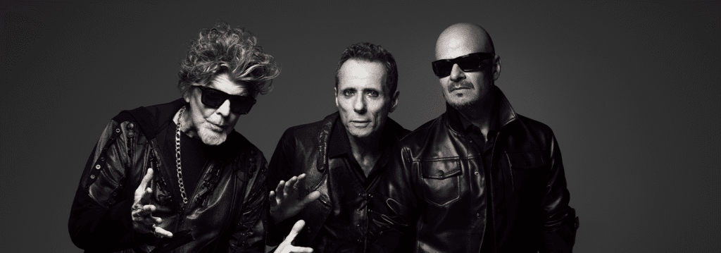 Logo da banda Titãs com referência ao álbum Cabeça Dinossauro